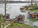 Lakeside homes and docks, with boat lifts, kayaks, and a serene waterfront, ideal for outdoor enthusiasts at 6599 Meadowlark Dr, Nineveh, IN 46164