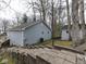 Exterior view of home showing a two story side elevation with garage and shed with stone staircase at 6599 Meadowlark Dr, Nineveh, IN 46164