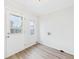 Laundry room with an exterior door and a window offering natural light at 709 S A St, Elwood, IN 46036