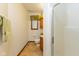 Standard bathroom featuring tiled floor, shower, toilet, and a storage cabinet at 7371 Windridge Way, Brownsburg, IN 46112