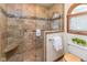 Elegant bathroom with tiled shower, seat, glass door, and stylish fixtures at 7371 Windridge Way, Brownsburg, IN 46112