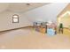 Spacious upper level bonus room with natural light and vaulted ceilings at 7371 Windridge Way, Brownsburg, IN 46112