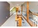 Second floor hallway with a view into living room and fireplace at 7371 Windridge Way, Brownsburg, IN 46112