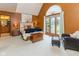 Spacious main bedroom with vaulted ceilings, ensuite bathroom, and large windows at 7371 Windridge Way, Brownsburg, IN 46112