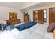 Large main bedroom with ensuite bathroom, closet, and sitting area at 7371 Windridge Way, Brownsburg, IN 46112
