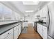 The kitchen boasts stainless steel appliances, granite countertops, and ample cabinet space at 7418 Bluebird Ct, Indianapolis, IN 46254