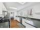 Bright eat-in kitchen features modern stainless steel appliances and plenty of counter space at 7418 Bluebird Ct, Indianapolis, IN 46254