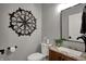 Stylish half-bathroom with elegant fixtures, providing a touch of sophistication for guests at 749 Meadowbrook Ln, Franklin, IN 46131