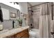 Stylish bathroom with granite vanity, shower, and neutral color scheme for relaxation at 749 Meadowbrook Ln, Franklin, IN 46131