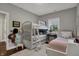 Charming bedroom with bunk beds and an abundance of play space at 749 Meadowbrook Ln, Franklin, IN 46131