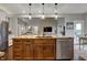 Gourmet kitchen island features a sink and bar seating, perfect for casual dining and entertaining at 749 Meadowbrook Ln, Franklin, IN 46131