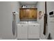 Practical laundry room equipped with modern washer and dryer, providing convenience for household chores at 749 Meadowbrook Ln, Franklin, IN 46131