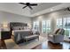 Serene main bedroom with ample natural light and a calming color palette, perfect for relaxation at 749 Meadowbrook Ln, Franklin, IN 46131