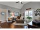 Cozy home office with hardwood floors, vaulted ceiling, and a comfortable seating area at 749 Meadowbrook Ln, Franklin, IN 46131