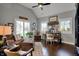 Inviting home office with a vaulted ceiling, hardwood floors, and ample natural light at 749 Meadowbrook Ln, Franklin, IN 46131