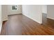 Bedroom featuring sleek hardwood floors, neutral walls, and natural light at 771 Carolina Way, Avon, IN 46123