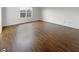 Bright bedroom with hardwood floors and a large window at 771 Carolina Way, Avon, IN 46123