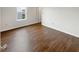 Bedroom featuring sleek hardwood floors and a well-lit interior at 771 Carolina Way, Avon, IN 46123
