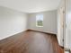 Bright bedroom with hardwood floors and a large window at 771 Carolina Way, Avon, IN 46123