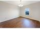 Bright dining room featuring sleek hardwood floors and a modern chandelier at 771 Carolina Way, Avon, IN 46123