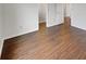 Hallway featuring sleek hardwood floors and bright natural light at 771 Carolina Way, Avon, IN 46123