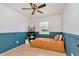 Stylish bedroom featuring wood floors, wainscoting, and natural light at 7859 Jennifer Ln, Brownsburg, IN 46112