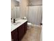A bathroom features a vanity, toilet, and a shower at 796 Booneway Ln, Bargersville, IN 46106