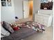 A cozy bedroom features a bed, dresser, and neutral carpeting at 796 Booneway Ln, Bargersville, IN 46106