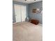 A cozy bedroom features a closet, neutral carpeting, and gray walls at 796 Booneway Ln, Bargersville, IN 46106