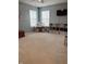 A bedroom features ample natural light, neutral carpeting, and a play kitchen at 796 Booneway Ln, Bargersville, IN 46106