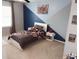 A cozy bedroom features a bed, two nightstands, and interesting paint on the walls at 796 Booneway Ln, Bargersville, IN 46106