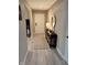 Stylish entryway boasts modern decor and neutral tones, leading into the home at 796 Booneway Ln, Bargersville, IN 46106