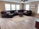 Bright living room with a large sectional, neutral decor and a cozy rug at 796 Booneway Ln, Bargersville, IN 46106