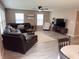 Spacious living room features a comfortable sectional and lots of natural light at 796 Booneway Ln, Bargersville, IN 46106
