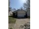 Charming single-Gathering home with a driveway and manicured lawn at 8219 Lake Tree Ln, Indianapolis, IN 46217
