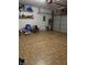 Spacious garage with epoxy flooring, offering ample storage and parking at 8219 Lake Tree Ln, Indianapolis, IN 46217