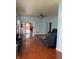 Spacious living room featuring wood floors and neutral blue walls at 8219 Lake Tree Ln, Indianapolis, IN 46217