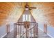 Bright attic space with custom woodwork, a spiral staircase and natural light from the large window at 8394 S 600 W, Pendleton, IN 46064