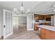 Well-lit kitchen featuring wood cabinets and an open layout perfect for entertaining at 8394 S 600 W, Pendleton, IN 46064