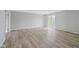 Spacious room with sliding glass door, seamless flooring, and natural light at 8394 S 600 W, Pendleton, IN 46064