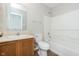 Clean bathroom showcasing a white vanity, toilet, and a combined shower and tub, offering a fresh and functional space at 8529 Sansa St, Camby, IN 46113