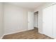 Inviting bedroom with wood-look flooring, large closet, and neutral walls that provide a cozy retreat at 8529 Sansa St, Camby, IN 46113