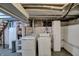 Basement laundry area with washer and dryer, providing a functional space for household chores at 922 Cottage Ave, Indianapolis, IN 46203