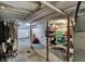 View of the unfinished basement with concrete floor and exposed ceiling beams at 922 Cottage Ave, Indianapolis, IN 46203
