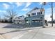 Charming multi-use building with retail spaces and apartments available on a sunny day at 922 Cottage Ave, Indianapolis, IN 46203