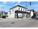 Commercial building with black trim and ample windows offers excellent street presence at 922 Cottage Ave, Indianapolis, IN 46203