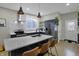 Modern kitchen with white countertops, blue cabinets, and stainless steel appliances at 922 Cottage Ave, Indianapolis, IN 46203