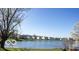 Scenic view of lakefront community showcasing peaceful environment, waterfront homes, and clear sky at 10105 Yosemite Ln, Indianapolis, IN 46234