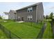 Backyard is fenced and includes a small patio area at 10319 Pronghorn Ln, Indianapolis, IN 46239