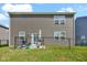 A fully fenced backyard with a patio is perfect for outdoor grilling and entertaining at 10319 Pronghorn Ln, Indianapolis, IN 46239